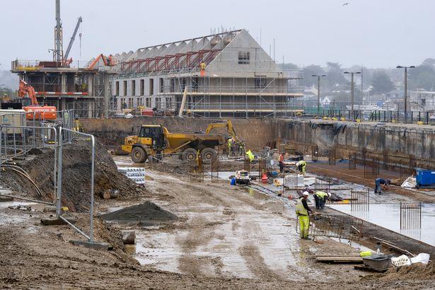Workers are digging two underground car parks Workers are digging two underground car parks